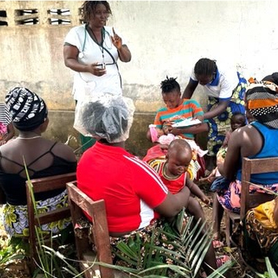 Estella giving a health talk in Sierra Leone