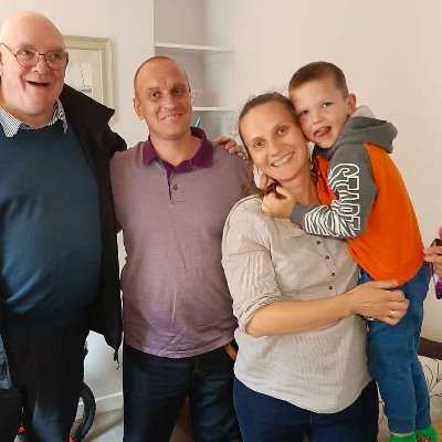 Trustee Lennie with Ukrainian refugees in Northern Ireland